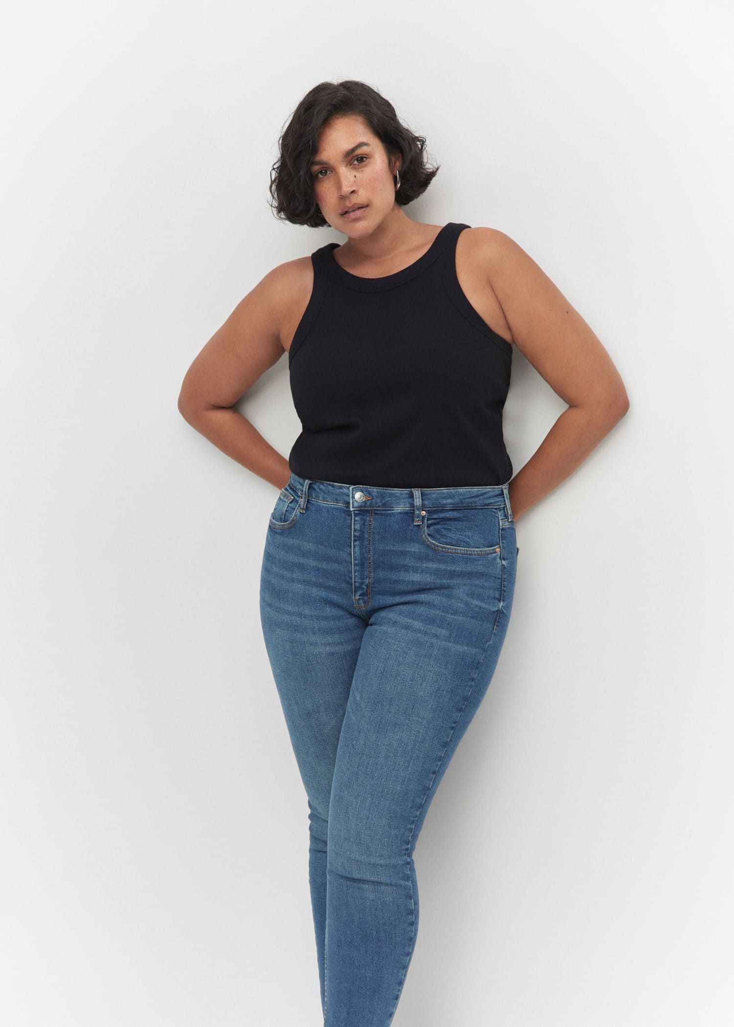 Jeans skinny tiro alto