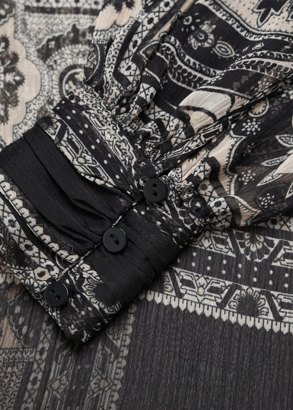 Blusa semitransparente estampada