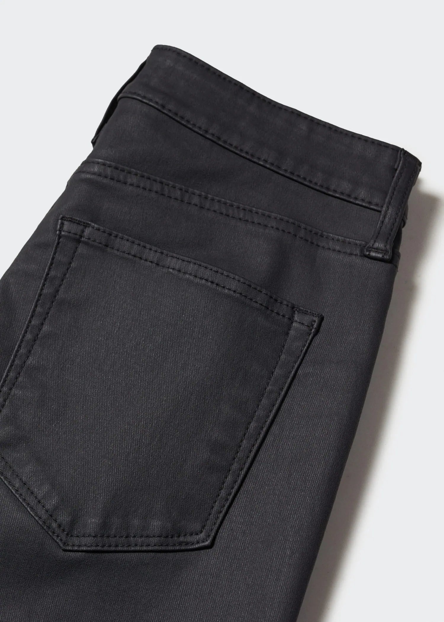 Jeans skinny tiro alto encerados
