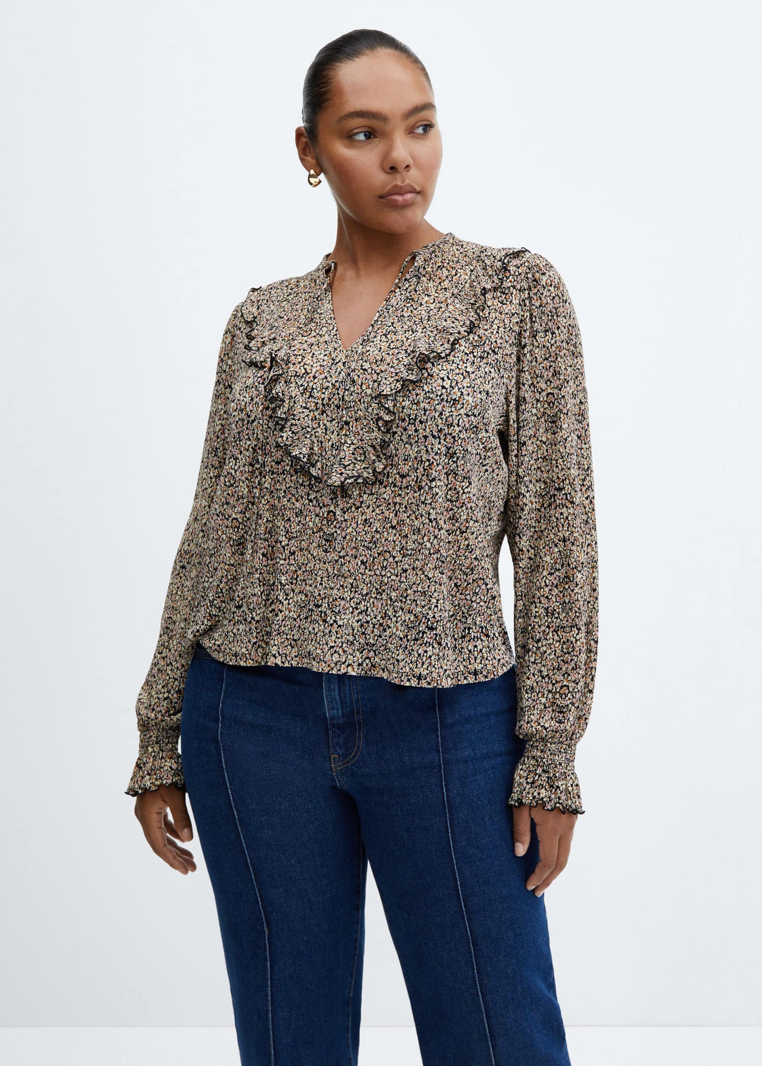 Blusa fluida volante
