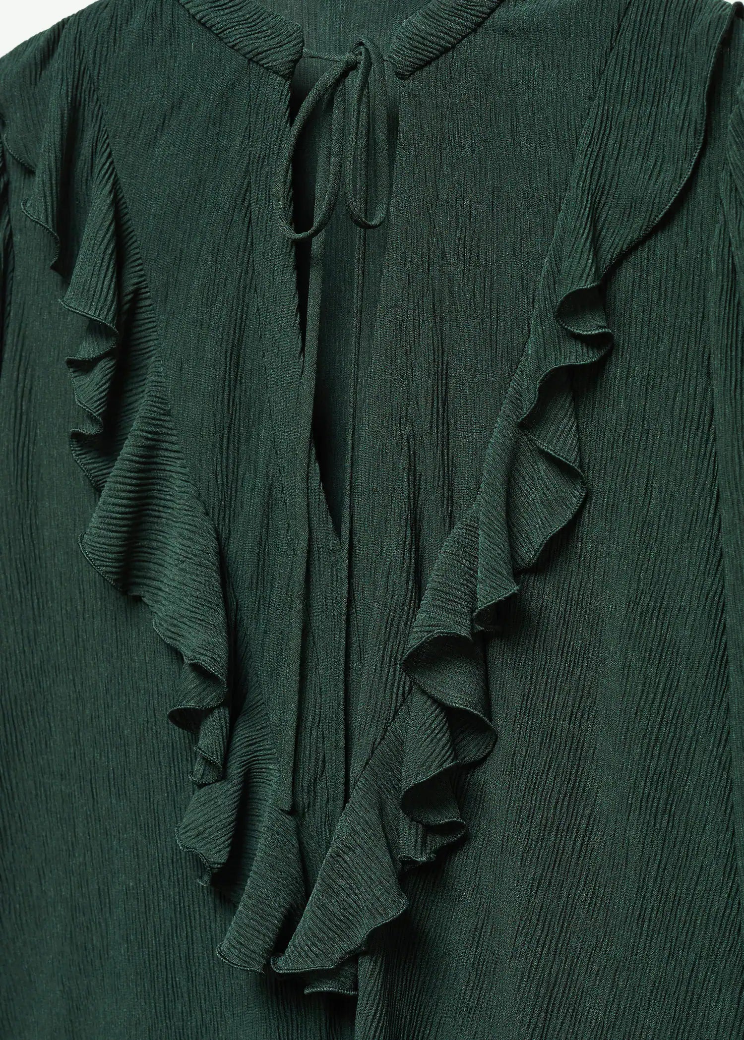 Blusa fluida volante